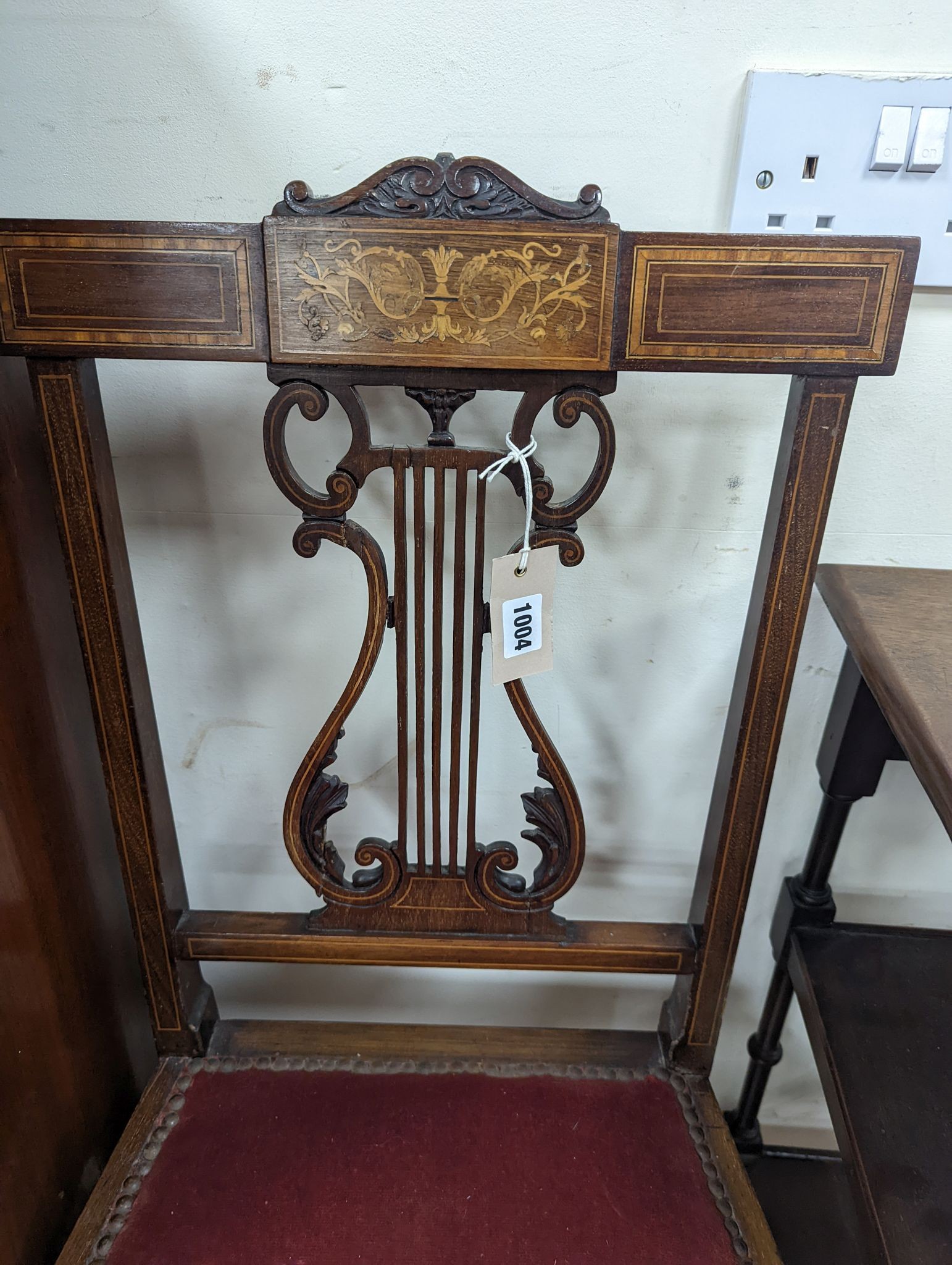 A pair of Edwardian inlaid mahogany lyre back chairs